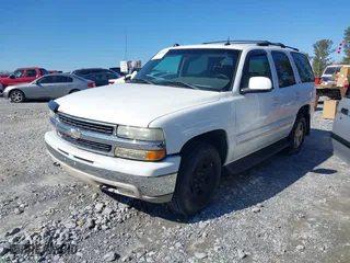 2004 Chevrolet Tahoe LT with VIN 1GNEC13Z34R150190, listed as a IAAI auction lot 41552515 with 258,473 mi miles. Bid and sale history available at carsss.com. Image 2.