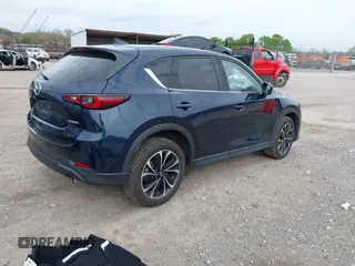 2022 Mazda CX-5 2.5 S Premium Plus Package with VIN JM3KFBEM1N0527915, listed as a IAAI auction lot 41942476 with 40,145 mi miles. Bid and sale history available at carsss.com. Image 4.