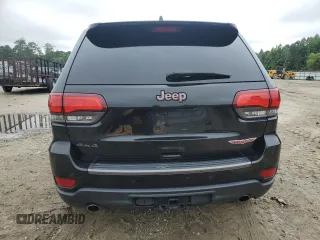 2017 Jeep Grand Cherokee Trailhawk with VIN 1C4RJFLG7HC674060, listed as a Copart auction lot 61130225 with 79,351 mi miles and Salvage title. Bid and sale history available at DreamBid. Image 6.