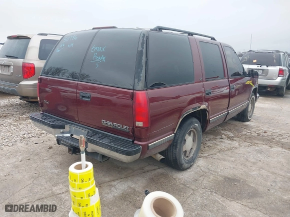 1999 Chevrolet Tahoe with VIN 1GNEC13R8XJ511786, listed as a IAAI auction lot 41538890 with 196,764 mi miles. Bid and sale history available at carsss.com. Image 4.