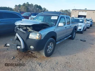 2003 Nissan Frontier SE z VIN 1N6ED29X23C450948, wystawiony jako IAAI lot #41902685 z przebiegiem 209 330 mil mil oraz . Historia ofert i sprzedaży dostępna na DreamBid. Obrazek 2.