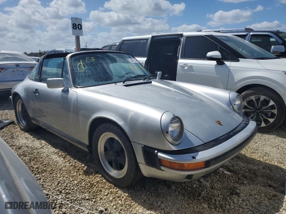 1986 Porsche 911 with VIN WP0EB0917GS161455, listed as a Copart auction lot 74672764 with 80,076 mi miles and Salvage Title. Bid and sale history available at carsss.com. Image 4.