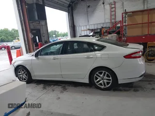 2016 Ford Fusion SE with VIN 1FA6P0H77G5114717, listed as a IAAI auction lot 42166800 with 186,610 mi miles and . Bid and sale history available at DreamBid. Image 14.