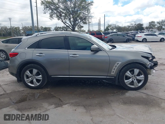 2009 Infiniti FX with VIN JNRAS18U39M101020, listed as a IAAI auction lot 41663215 with 210,583 mi miles and . Bid and sale history available at DreamBid. Image 14.