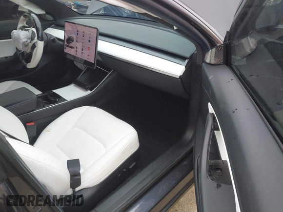 2019 Tesla Model 3 Mid Range with VIN 5YJ3E1EA8KF538083, listed as a IAAI auction lot 41891458 with 46,958 mi miles and . Bid and sale history available at carsss.com. Image 5.