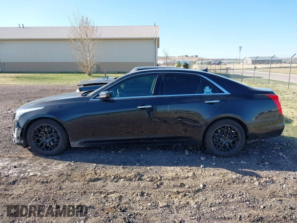 2014 Cadillac CTS Luxury AWD z VIN 1G6AX5SX9E0177017, wystawiony jako IAAI lot #42038429 z przebiegiem 113 656 mil mil oraz . Historia ofert i sprzedaży dostępna na DreamBid. Obrazek 14.