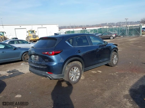 2022 Mazda CX-5 2.5 S Carbon Edition with VIN JM3KFBCM9N0565525, listed as a IAAI auction lot 41199351 with NaN miles. Bid and sale history available at carsss.com. Image 4.