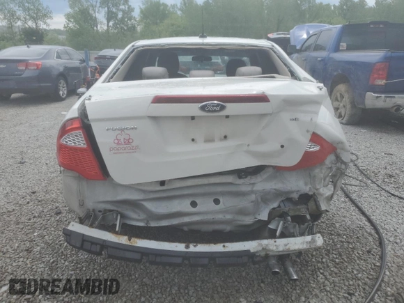 2010 Ford Fusion SE z VIN 3FAHP0HA9AR306505, wystawiony jako Copart lot #55057295 z przebiegiem 214 141 mil mil oraz Nie do naprawy • Non repairable. Historia ofert i sprzedaży dostępna na DreamBid. Obrazek 6.