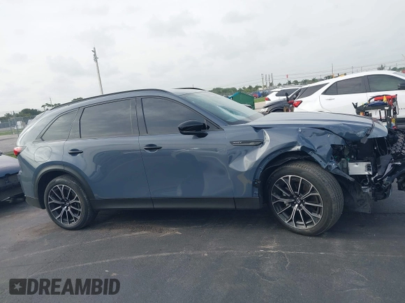 2025 Mazda CX-70 Premium Plus with VIN JM3KJEHA3S1126454, listed as a IAAI auction lot 42427454 with 5,648 mi miles and . Bid and sale history available at DreamBid. Image 13.