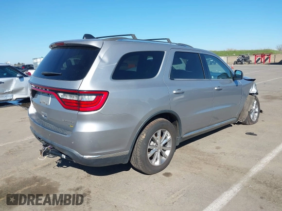 2014 Dodge Durango Limited with VIN 1C4RDJDG4EC522418, listed as a IAAI auction lot 41675719 with 151,826 mi miles and . Bid and sale history available at DreamBid. Image 4.