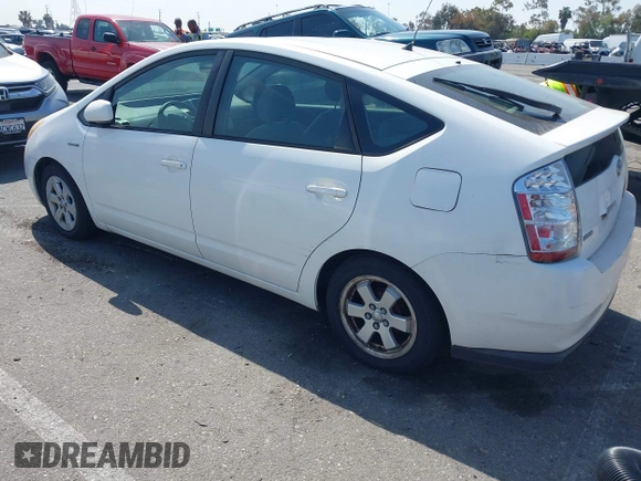 2006 Toyota Prius with VIN JTDKB20UX67527206, listed as a IAAI auction lot 42093925 with 124,256 mi miles. Bid and sale history available at carsss.com. Image 3.