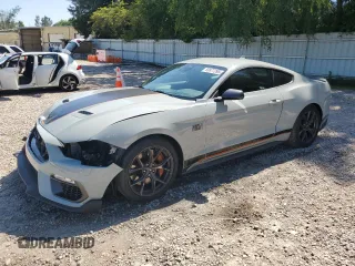 2021 Ford Mustang Mach 1 with VIN 1FA6P8R04M5551165, listed as a Copart auction lot 59977295 with 11,739 mi miles and Salvage title. Bid and sale history available at DreamBid. Image 1.