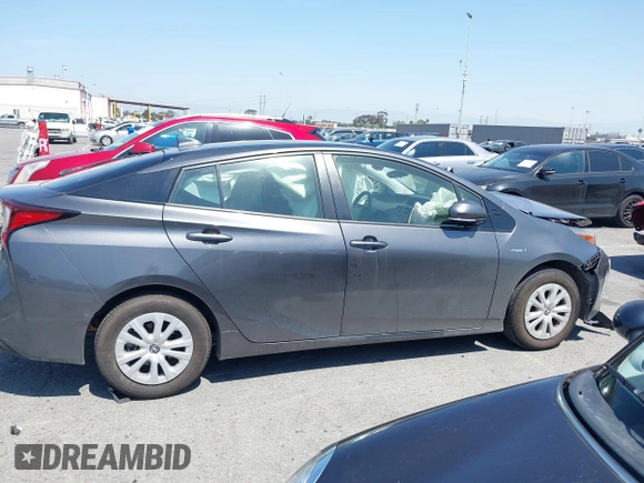2020 Toyota Prius L Eco z VIN JTDKARFU3L3111990, wystawiony jako IAAI lot #41964834 z przebiegiem 67 873 mil mil oraz . Historia ofert i sprzedaży dostępna na DreamBid. Obrazek 13.