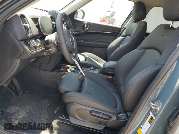 2024 MINI Countryman Cooper S with VIN WMZ83BR03R3R51328, listed as a Copart auction lot 58885025 with 3,089 mi miles and Salvage title. Bid and sale history available at DreamBid. Image 7.
