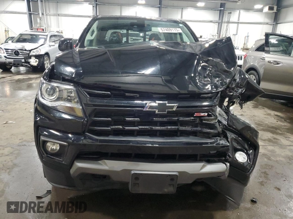 2021 Chevrolet Colorado 4WD Z71 with VIN 1GCGTDEN8M1171810, listed as a Copart auction lot 57409115 with 100,579 mi miles and Salvage title. Bid and sale history available at DreamBid. Image 5.