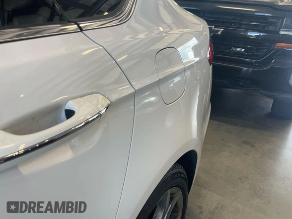 2020 Ford Fusion SEL z VIN 3FA6P0CD4LR177021, wystawiony jako IAAI lot #42743422 z przebiegiem 81 131 mil mil oraz . Historia ofert i sprzedaży dostępna na DreamBid. Obrazek 25.