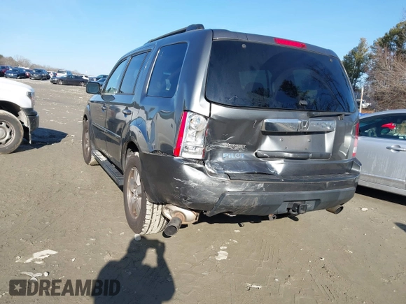 2011 Honda Pilot EX-L with VIN 5FNYF3H66BB018616, listed as a IAAI auction lot 41449001 with 221,499 mi miles and . Bid and sale history available at DreamBid. Image 16.