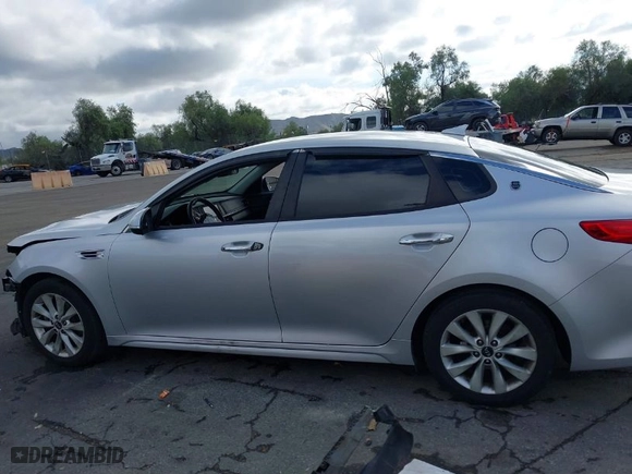 2018 Kia Optima LX with VIN 5XXGT4L33JG268995, listed as a IAAI auction lot 41525938 with 134,192 mi miles. Bid and sale history available at carsss.com. Image 14.