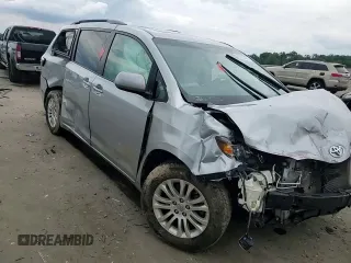 2015 Toyota Sienna XLE с VIN 5TDYK3DC1FS541180, выставлен на аукционе Copart как лот 59078585 с пробегом 94 014 миль миль и Списание • Salvage title. История ставок и продаж доступна на DreamBid. Изображение 14.