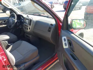2003 Ford Escape XLT Popular 2 with VIN 1FMCU93183KC65571, listed as a IAAI auction lot 41768982 with 150,658 mi miles. Bid and sale history available at carsss.com. Image 5.
