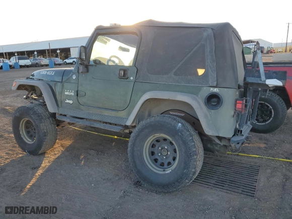 2005 Jeep Wrangler X with VIN 1J4FA39S25P309698, listed as a Copart auction lot 82518314 with 193,340 mi miles and Salvage Title. Bid and sale history available at carsss.com. Image 2.