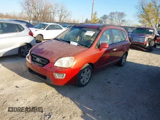2008 Kia Rondo LX with VIN KNAFG526587147323, listed as a IAAI auction lot 41550909 with 150,967 mi miles. Bid and sale history available at carsss.com. Image 2.
