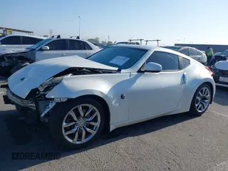 2014 Nissan 370Z Touring with VIN JN1AZ4EH7EM635655, listed as a IAAI auction lot 42217280 with 150,200 mi miles and . Bid and sale history available at DreamBid. Image 14.