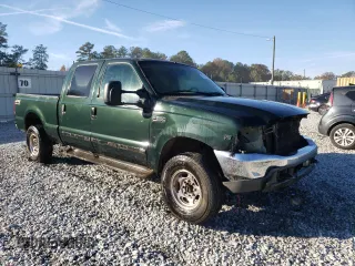 2001 Ford Super Duty F-250 XL with VIN 1FTNW21SX1EA33933, listed as a Copart auction lot 81153254 with 670,845 mi miles and Salvage Title. Bid and sale history available at carsss.com. Image 4.