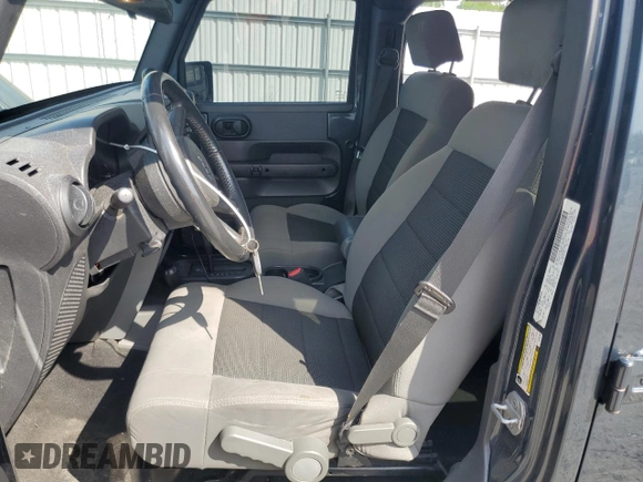 2008 Jeep Wrangler Unlimited X with VIN 1J4GA39188L520203, listed as a Copart auction lot 55226525 with 144,560 mi miles and Salvage Title. Bid and sale history available at carsss.com. Image 7.