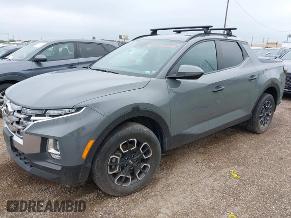 2023 Hyundai Santa Cruz SEL z VIN 5NTJCDAE6PH041342, wystawiony jako IAAI lot #42192227 z przebiegiem Nie podano mil oraz . Historia ofert i sprzedaży dostępna na DreamBid. Obrazek 2.