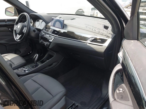2021 BMW X1 sDrive28i with VIN WBXJG7C0XM5T45715, listed as a IAAI auction lot 42014499 with 23,793 mi miles and . Bid and sale history available at DreamBid. Image 5.