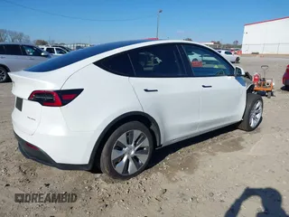 2023 Tesla Model Y Long Range with VIN 7SAYGAEE1PF828338, listed as a IAAI auction lot 40978725 with Not Provided miles and . Bid and sale history available at DreamBid. Image 4.
