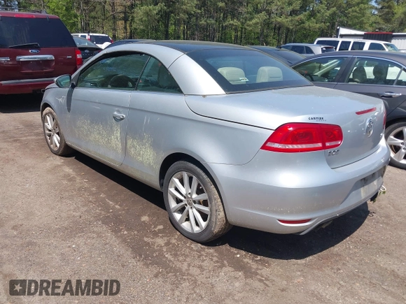2012 Volkswagen Eos Komfort with VIN WVWBW7AH8CV001621, listed as a IAAI auction lot 41988717 with 146,882 mi miles and . Bid and sale history available at DreamBid. Image 3.