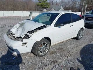 2004 Ford Focus ZX3 with VIN 3FAFP313X4R107035, listed as a IAAI auction lot 41204355 with 185,081 mi miles and . Bid and sale history available at carsss.com. Image 2.