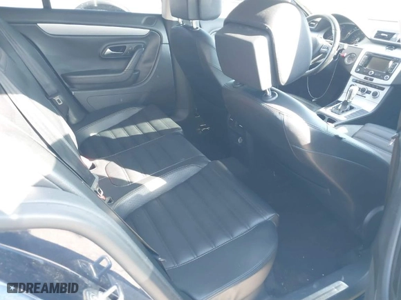 2013 Volkswagen CC Sport with VIN WVWBN7AN8DE510330, listed as a IAAI auction lot 40957809 with 119,859 mi miles. Bid and sale history available at carsss.com. Image 8.