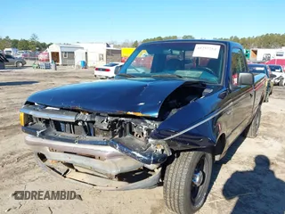 1997 Ford Ranger XLT z VIN 1FTCR10A1VUC49988, wystawiony jako IAAI lot #41257264 z przebiegiem 414 401 mil mil oraz . Historia ofert i sprzedaży dostępna na DreamBid. Obrazek 6.