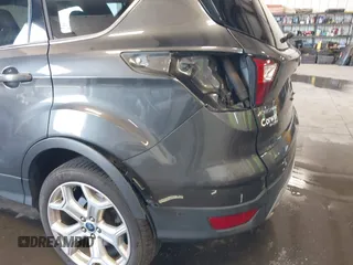 2019 Ford Escape Titanium with VIN 1FMCU9J97KUC55772, listed as a IAAI auction lot 42514001 with 77,737 mi miles and . Bid and sale history available at DreamBid. Image 18.