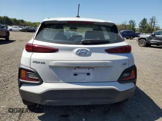 2021 Hyundai Kona SE z VIN KM8K1CAA7MU659637, wystawiony jako Copart lot #54394795 z przebiegiem 90 366 mil mil oraz Szkody całkowita. Historia ofert i sprzedaży dostępna na DreamBid. Obrazek 6.