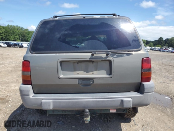 1997 Jeep Grand Cherokee Laredo with VIN 1J4GZ58S7VC505069, listed as a Copart auction lot 63255945 with 127,552 mi miles and Salvage title. Bid and sale history available at DreamBid. Image 6.