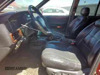 1997 Jeep Grand Cherokee Limited with VIN 1J4GZ78Y7VC573971, listed as a Copart auction lot 61358024 with 171,055 mi miles and Salvage Title. Bid and sale history available at carsss.com. Image 7.