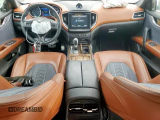 2018 Maserati Ghibli S Q4 GranLusso z VIN ZAM57YTL8J1265648, wystawiony jako Copart lot #56295795 z przebiegiem 51 857 mil mil oraz Szkoda całkowita • Salvage title. Historia ofert i sprzedaży dostępna na DreamBid. Obrazek 8.