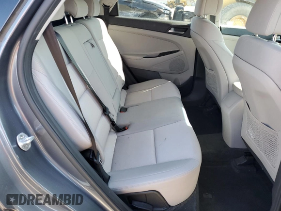 2017 Hyundai Tucson SE z VIN KM8J33A44HU376246, wystawiony jako Copart lot #52453345 z przebiegiem 97 306 mil mil oraz Szkoda całkowita • Salvage title. Historia ofert i sprzedaży dostępna na DreamBid. Obrazek 11.