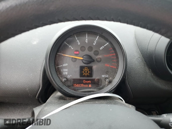 2015 MINI Countryman with VIN WMWZB3C52FWM33204, listed as a Copart auction lot 51680405 with 154,839 mi miles and Salvage Title. Bid and sale history available at DreamBid. Image 9.