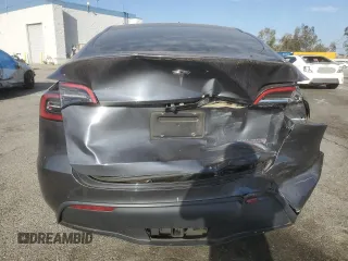 2022 Tesla Model Y Performance with VIN 7SAYGDEF3NF490643, listed as a Copart auction lot 46975825 with 50,792 mi miles and Salvage Title. Bid and sale history available at DreamBid. Image 6.