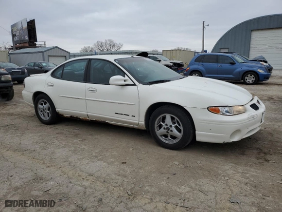 2003 Pontiac Grand Prix SE with VIN 1G2WK52J63F164754, listed as a Copart auction lot 86290534 with 219,235 mi miles and Salvage Title. Bid and sale history available at carsss.com. Image 4.