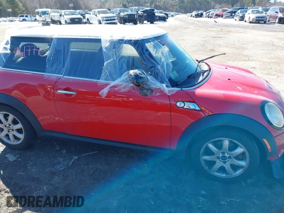 2009 MINI Hardtop S with VIN WMWMF73589TT95974, listed as a IAAI auction lot 41617775 with Not provided miles and . Bid and sale history available at DreamBid. Image 13.