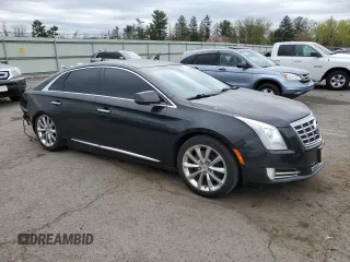 2013 Cadillac XTS Luxury z VIN 2G61R5S37D9127597, wystawiony jako Copart lot #53841755 z przebiegiem 81 603 mil mil oraz Szkoda całkowita • Salvage title. Historia ofert i sprzedaży dostępna na DreamBid. Obrazek 4.