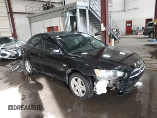2008 Mitsubishi Lancer DE with VIN JA3AU26UX8U015865, listed as a IAAI auction lot 41108329 with 131,884 mi miles. Bid and sale history available at carsss.com. Image 1.