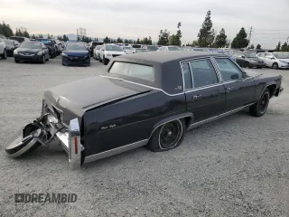 1984 Cadillac Fleetwood Brougham z VIN 1G6AW6989E9036452, wystawiony jako Copart lot #77039844 z przebiegiem 23 337 mil mil oraz Szkoda całkowita • Salvage title. Historia ofert i sprzedaży dostępna na DreamBid. Obrazek 3.