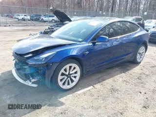 2022 Tesla Model 3 with VIN 5YJ3E1EA7NF188417, listed as a IAAI auction lot 41885623 with 105,457 mi miles and . Bid and sale history available at DreamBid. Image 24.